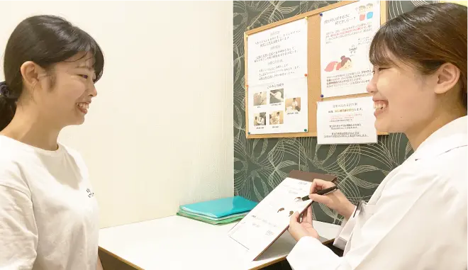 施術の説明風景